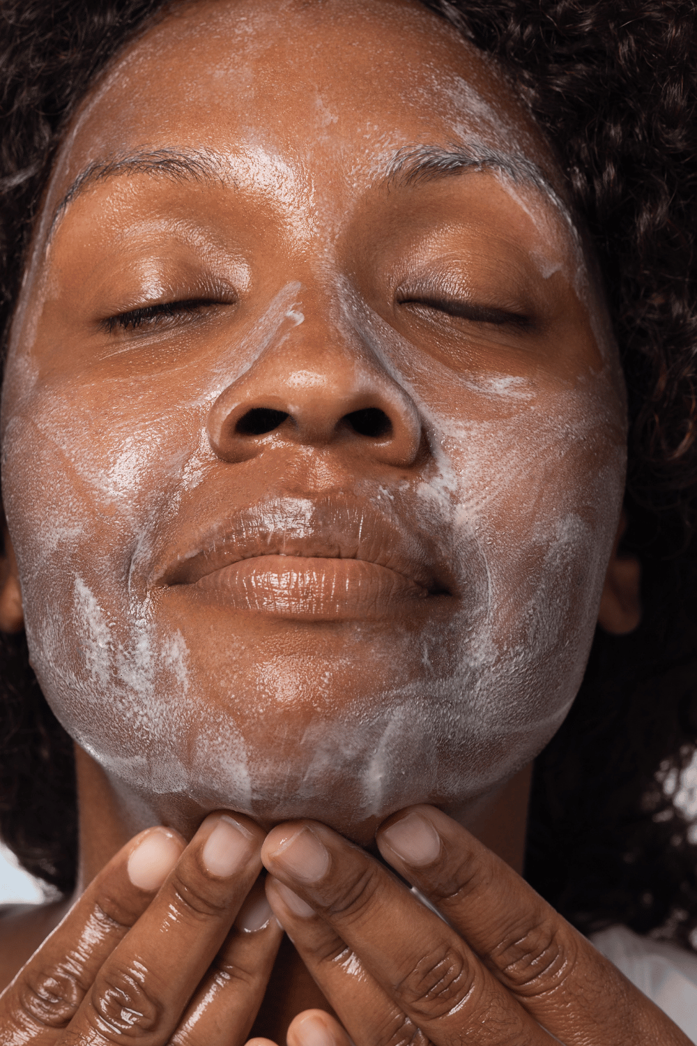Woman washing face