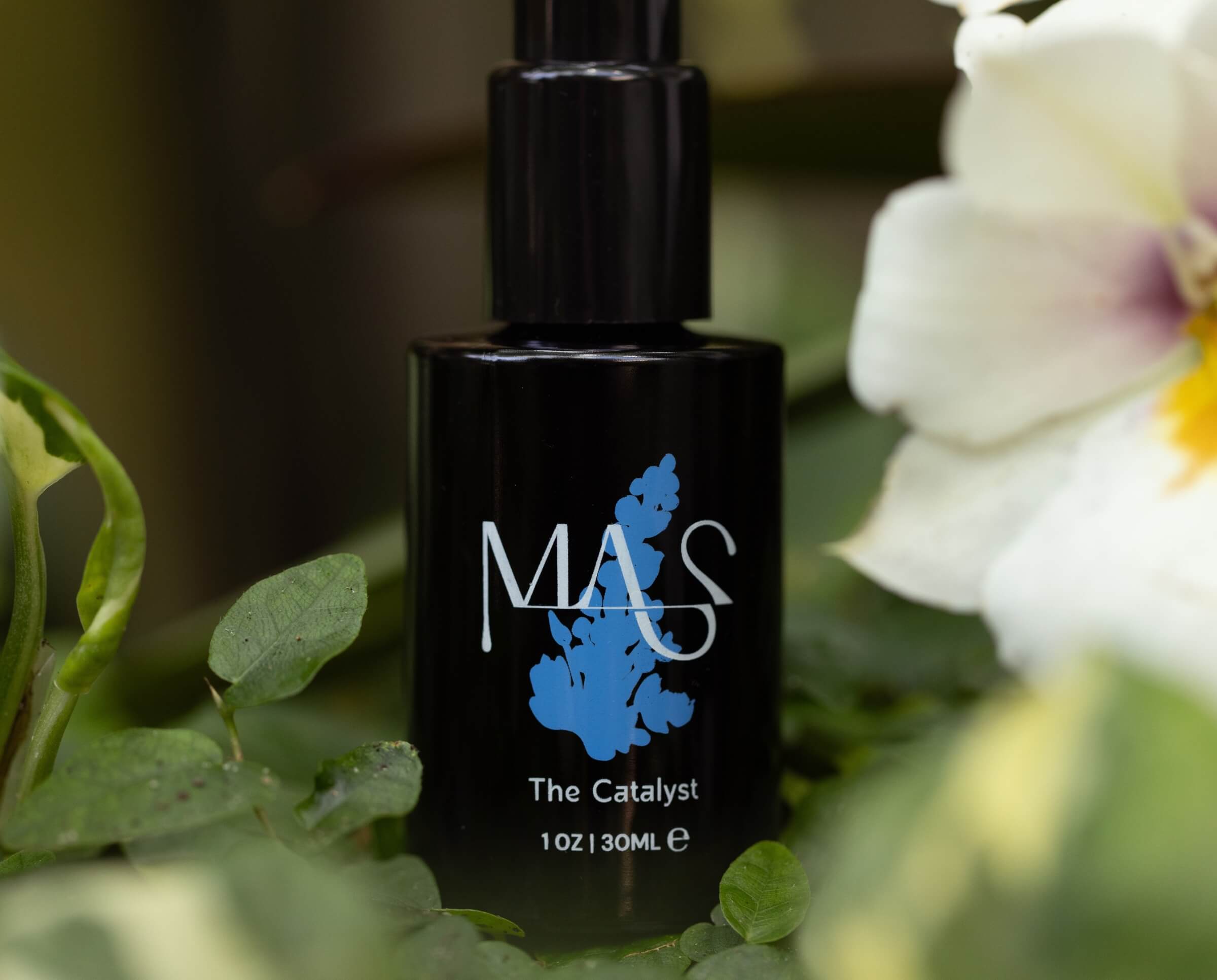 The Catalyst in front of a floral background